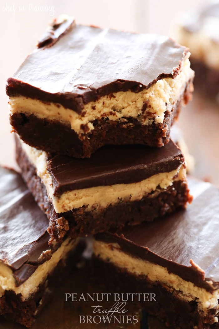 Peanut Butter Truffle Brownies... OH MY GOSH! These are INCREDIBLE! Layers of fudgy brownie, soft truffle and chocolate ganache combine to make one unforgettable dessert!