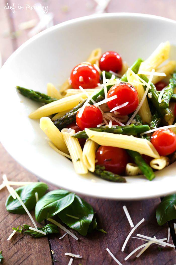 Penne Pasta with Asparagus and Cherry Tomatoes... this recipe is super light and packed with flavor! It is the perfect meal for spring time!
