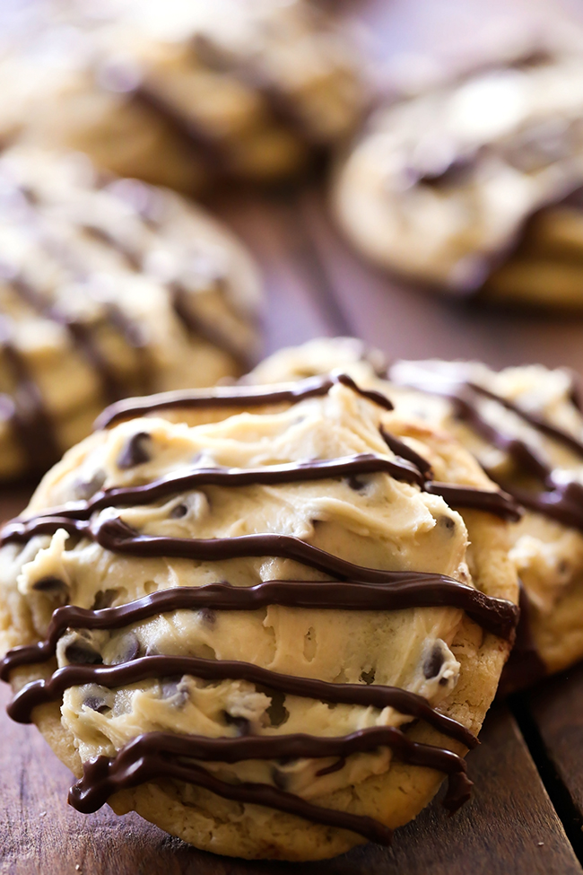 Chocolate Chip Cookie Dough Frosted Cookies... these are a chocolate chip cookie lover's dream come true! The cookie and a cookie dough frosting- its like the best of both worlds!