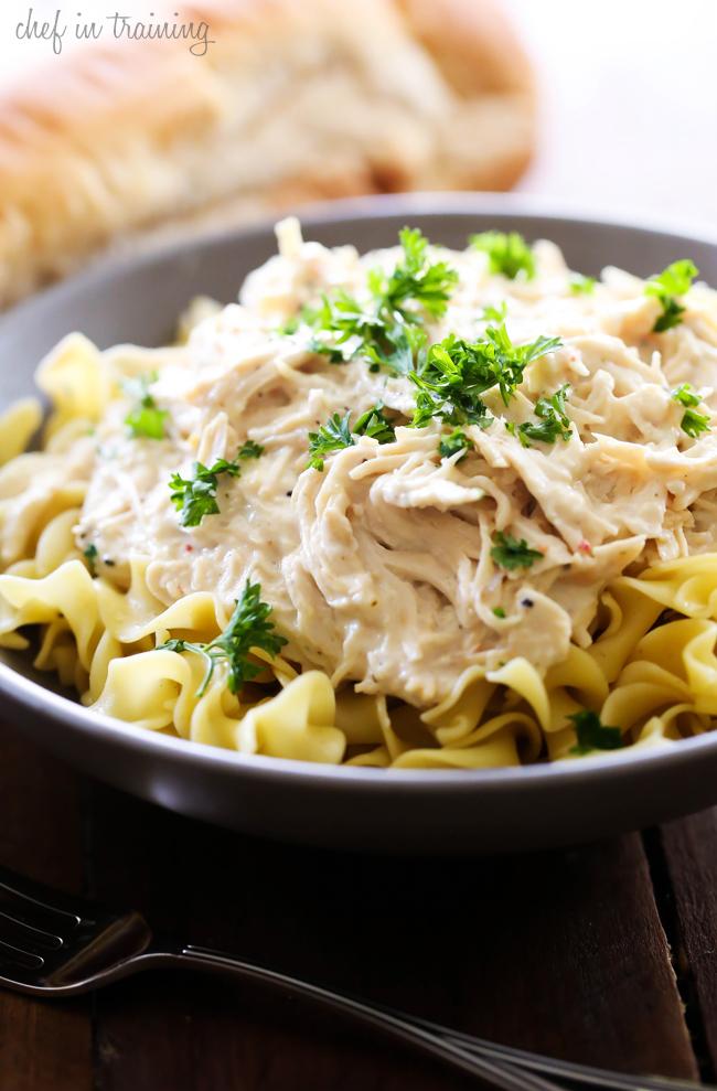 Slow Cooker Creamy Italian Chicken... this recipe is SO simple and packed with the most delicious flavor! It is perfect served over noodles or rice!