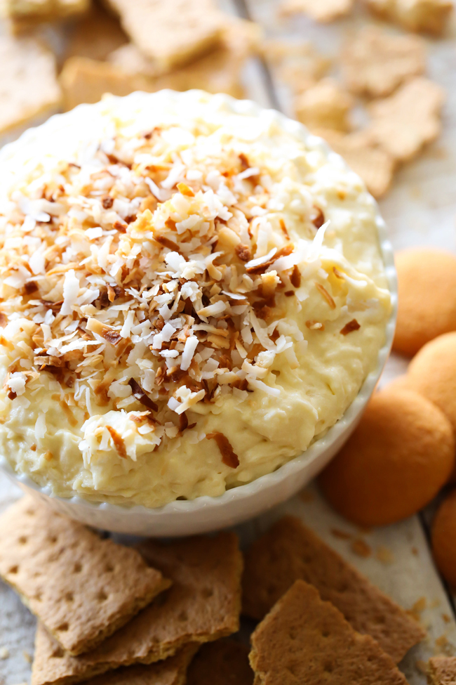 This Coconut Cream Pie Dip is seriously INCREDIBLE! The most delicious coconut cream pie transformed into one unforgettable appetizer! You will not be able to stop eating this stuff it is so addictive and absolutely DIVINE!