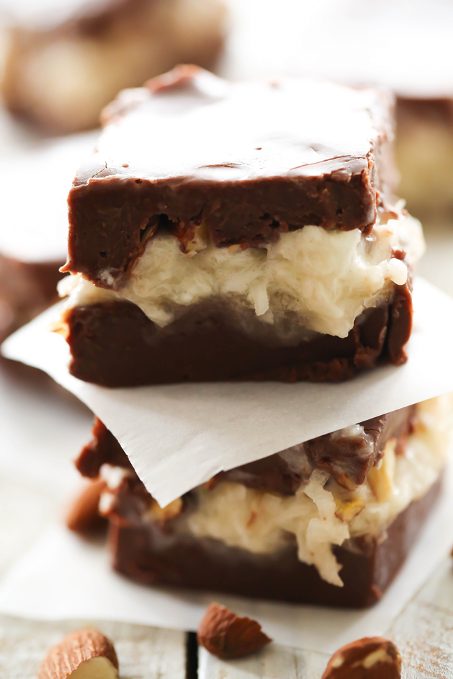 Almond Coconut Fudge... Rich smooth chocolate fudge filled with a delicious creamy coconut almond filling. This is sure to be a huge hit! It tastes like you are biting into a fudge version of Almond Joys!