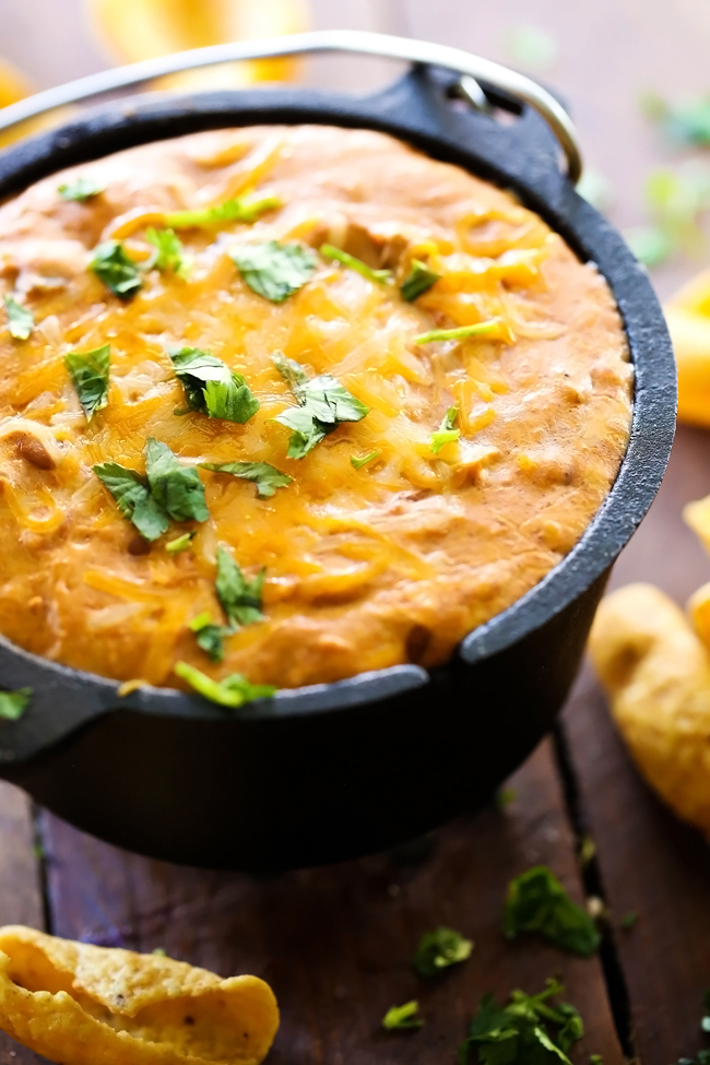 Cheesy Bean Dip... This dip is a crowd favorite! It is super simple to make and tastes incredible! Creamy, cheesy and delicious!