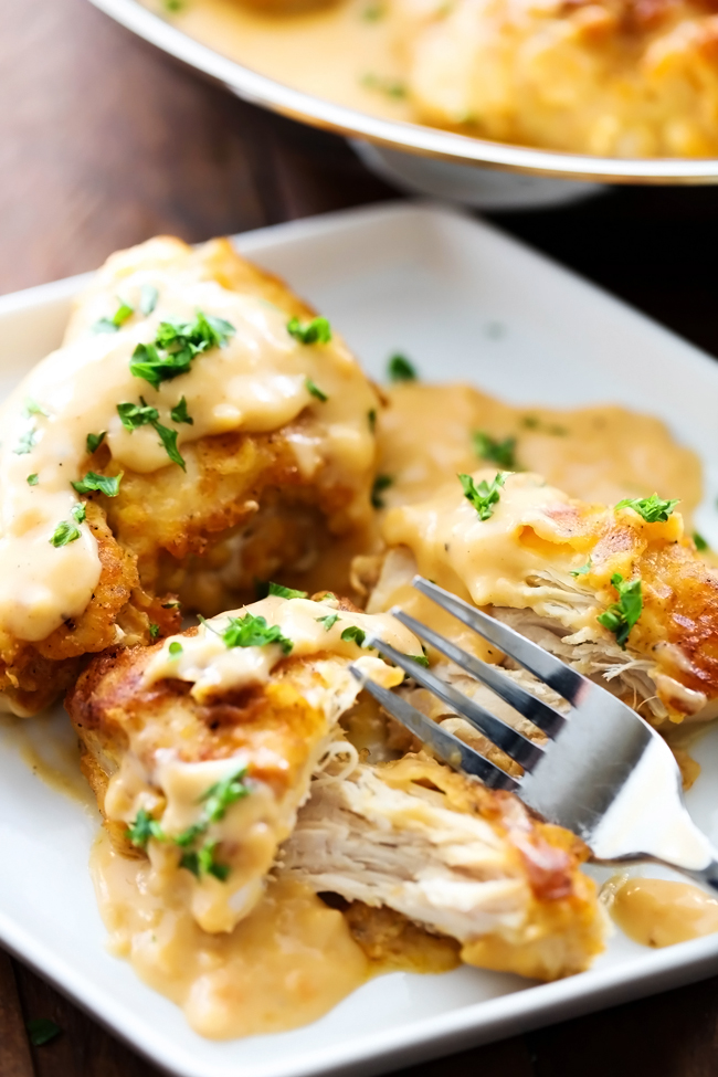 Chicken Paprika... An amazingly flavorful chicken that is coated in an incredible batter and has an unbelievably delicious gravy. This will be one meal you will want to eat again and again!