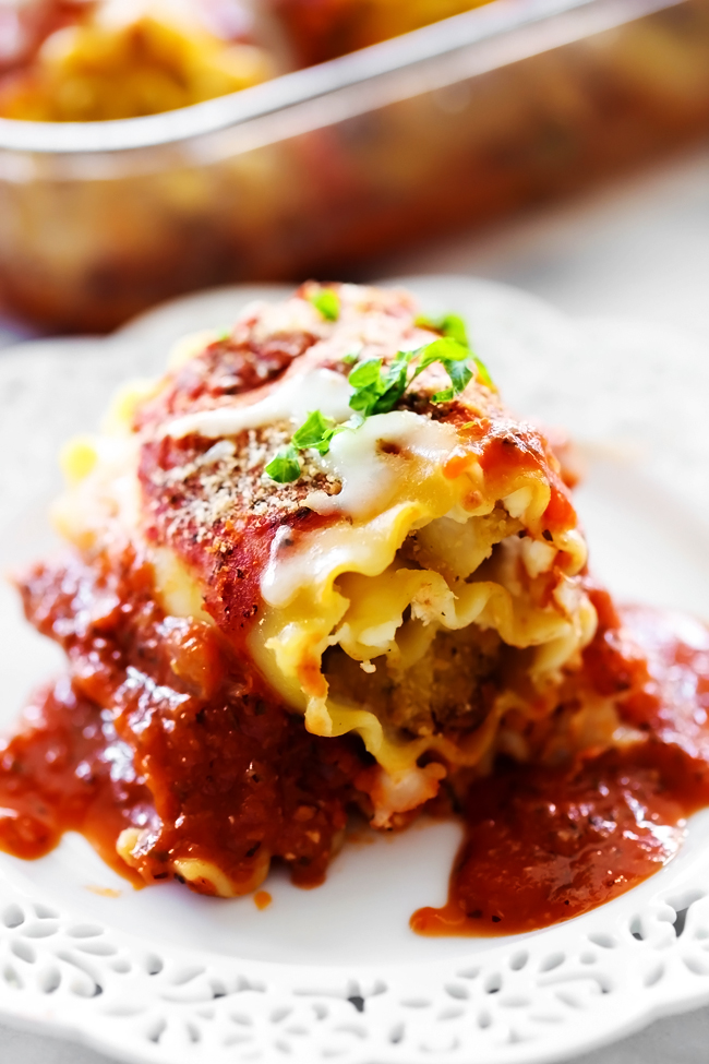 Chicken Parmesan Roll Ups.. Breaded Chicken and seasoned Parmesan Cream Cheese rolled up into lasagna noodles and covered in a delicious homemade marinara sauce. This dinner will quickly become a new favorite!