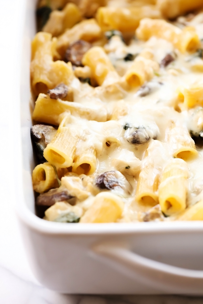 Chicken Spinach Mushroom Alfredo Casserole... This is such a flavorful and delicious meal that is really simple to make and packed with yummy ingredients! This will become a new favorite!