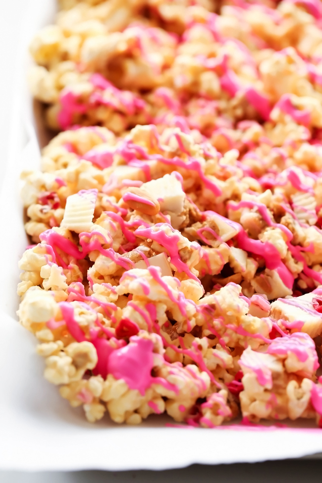 REESE'S Sweetheart Popcorn... A tasty and festive popcorn that is a delicious blend of white chocolate, peanut butter, peanuts and of course REESE's chocolates! #sponsored