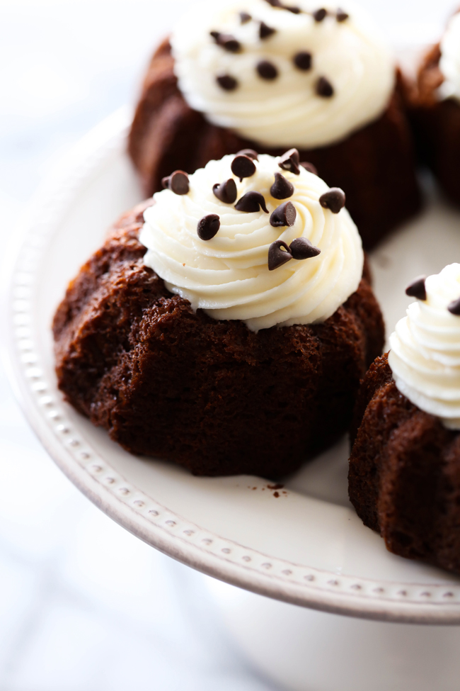 Mini Chocolate Bundt Cakes... These are an extremely moist chocolate cake with a delicious cream cheese frosting on top. It makes for an easy and tasty personal size treat!