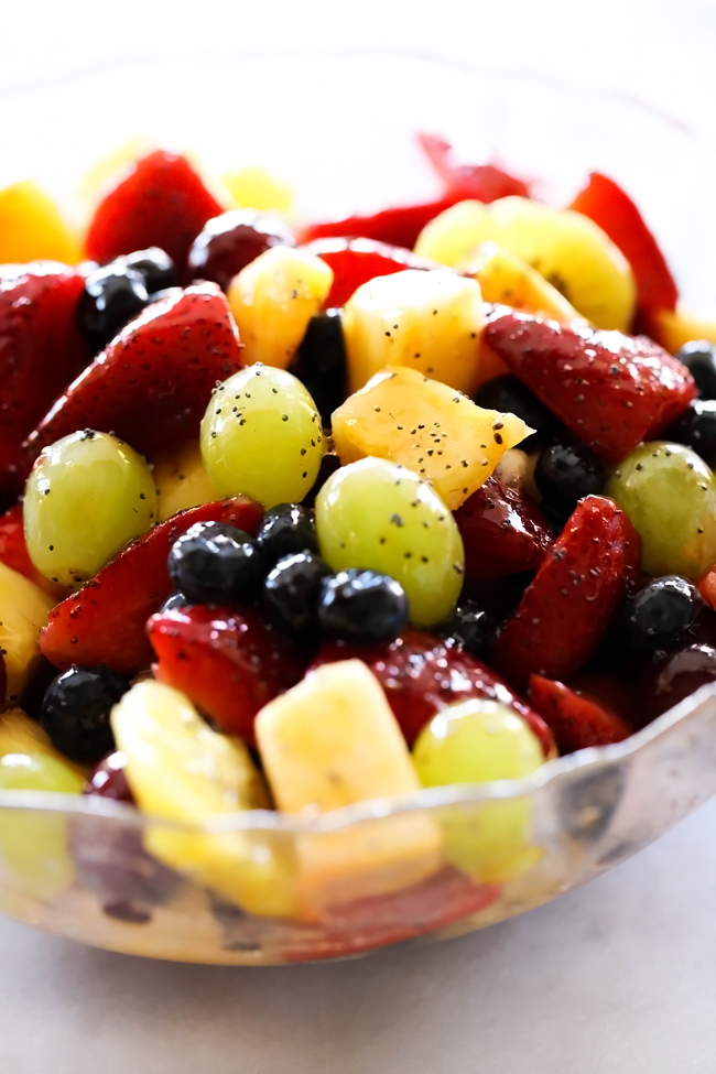 Best Ever Fruit Salad... A delicious fruit salad that has an incredible poppy seed apricot glaze! This would be a hit at any gathering!