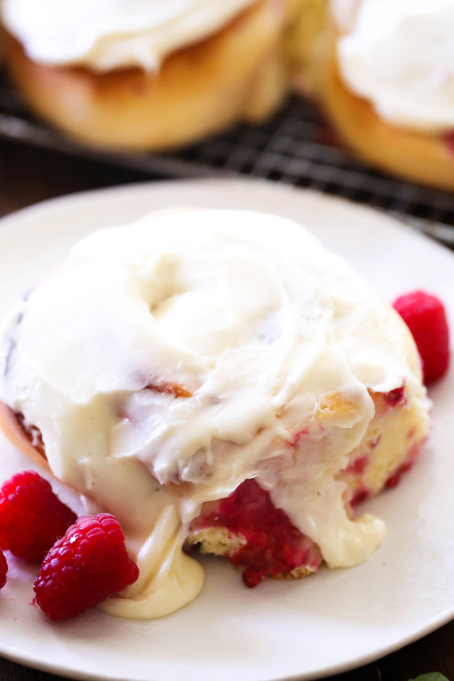 Raspberry Sweet Rolls... These are fantastic! A delicious raspberry cream cheese filling swirled in soft bread and topped with an incredible Cream Cheese Frosting.