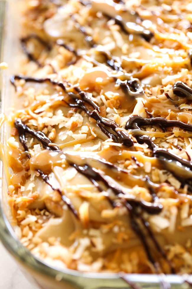 Samoa Sweet Rolls... These sweet rolls are made with a super simple cake-mix dough and have a delicious brown sugar toasted coconut filling and mini chocolate chips. They are topped with THE BEST caramel frosting, garnished with toasted coconut and drizzled with caramel and chocolate. They are unbelievably good!