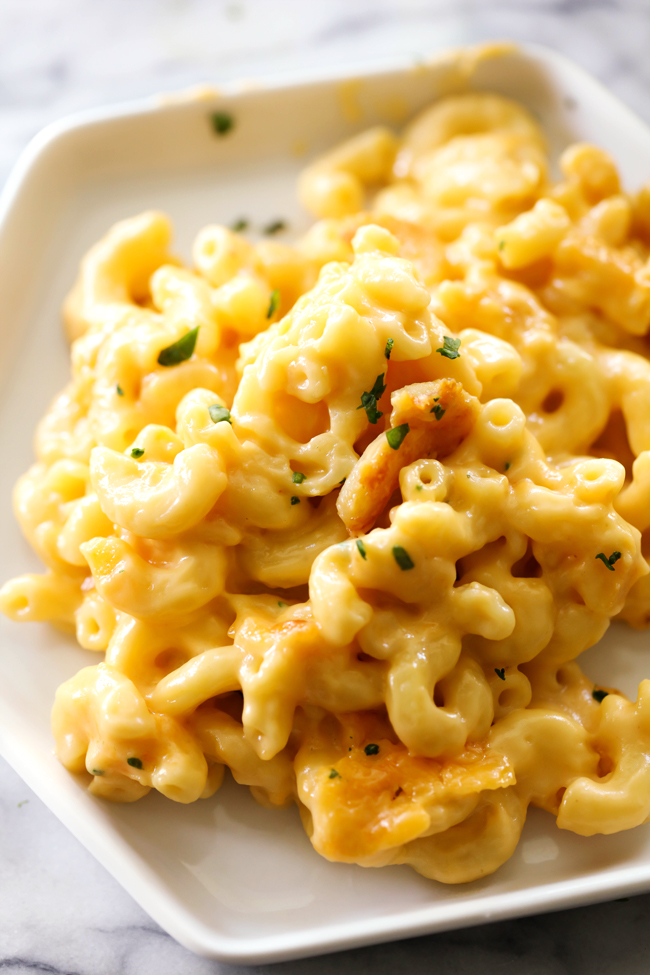 Best Ever Homemade Mac and Cheese... This Mac and Cheese is my mom's famous recipe. It is creamy, cheesy and completely addictive! It makes for a fabulous side dish whoever it goes!