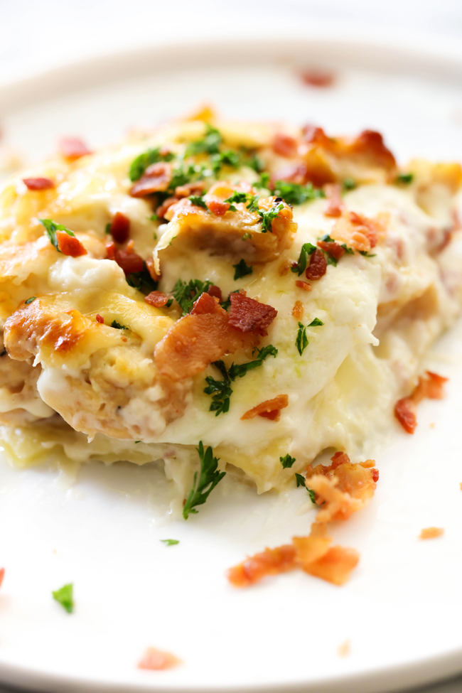 This Chicken Cordon Bleu Lasagna is a creamy and delicious meal that will become an instant family favorite! It is loaded with chicken, ham, bacon and a tasty cream cheese sauce that will blow your mind!