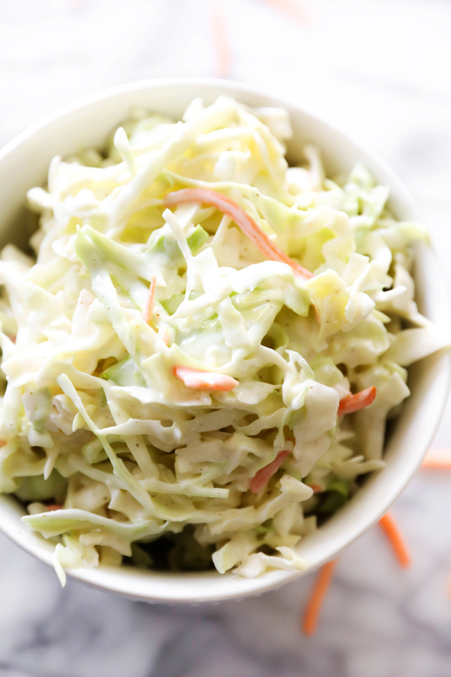 This Classic Coleslaw Recipe is a staple! If you are looking for the perfect coleslaw recipe, look no further because this is it! It is so easy and SO delicious!