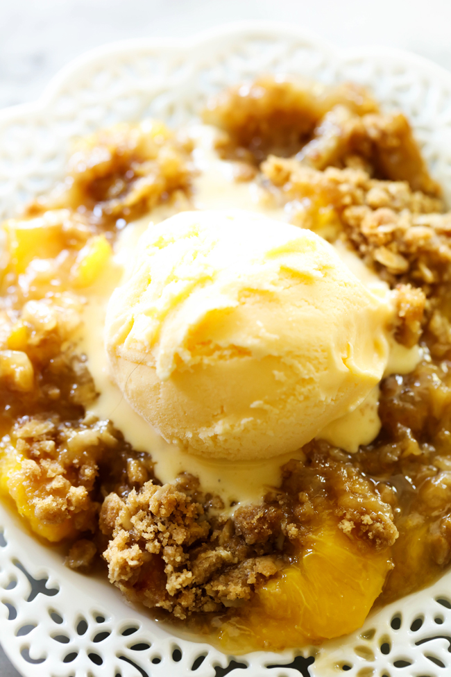 This Easy Homemade Peach Crisp is super simple and it tastes amazing! That crumb topping paired with the juicy peaches is a match made in heaven!