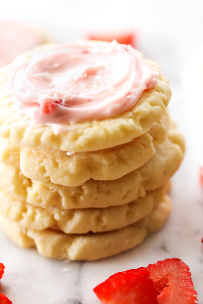 These Strawberry Lemonade Sugar Cookies are so easy and taste amazing! The strawberry and lemon flavors fuse together in both cookie and frosting and combine for an out of this world cookie!