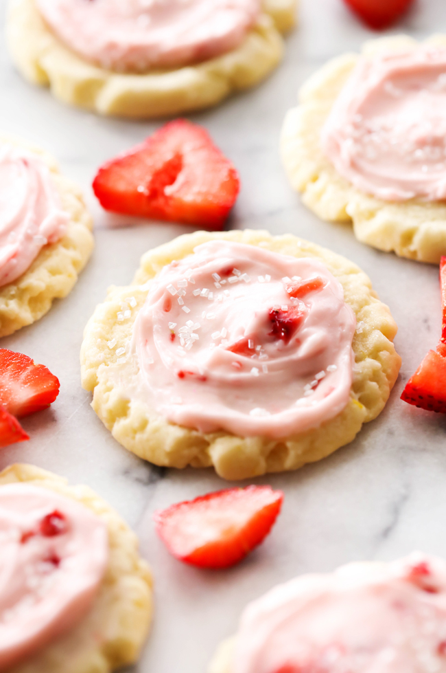 These Strawberry Lemonade Sugar Cookies are so easy and taste amazing! The strawberry and lemon flavors fuse together in both cookie and frosting and combine for an out of this world cookie!