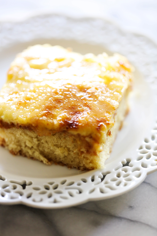 This Creme Brûlée Sheet Cake will be one of the best things you EVER eat! It is a vanilla bean cake topped with vanilla bean custard that has that one of a kind crisp and cracking caramelized creme brûlée sugar shell topping. This dessert is a complete show stopper!