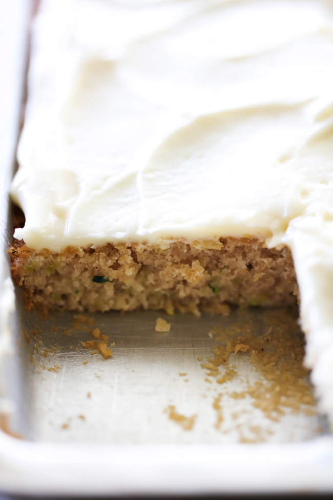 This Zucchini Sheet Cake is so moist and delicious! It feeds a crowd and is the perfect way to use up some zucchini. The cream cheese frosting on top is fabulous!