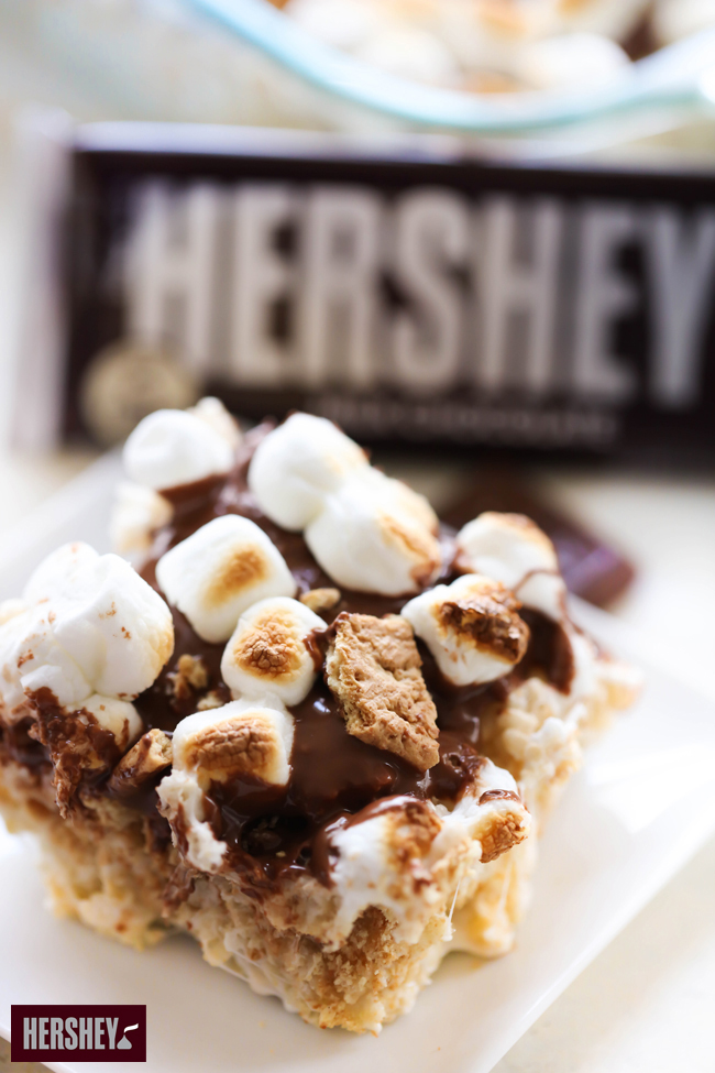  These HERSHEY'S Crispy S'more Treats are out of this world! The proportions of HERSHEY'S Chocolate Bar, gooey marshmallow and graham crackers are perfection. This is a simple dessert that is great for any occasion. sponsored by HERSHEY