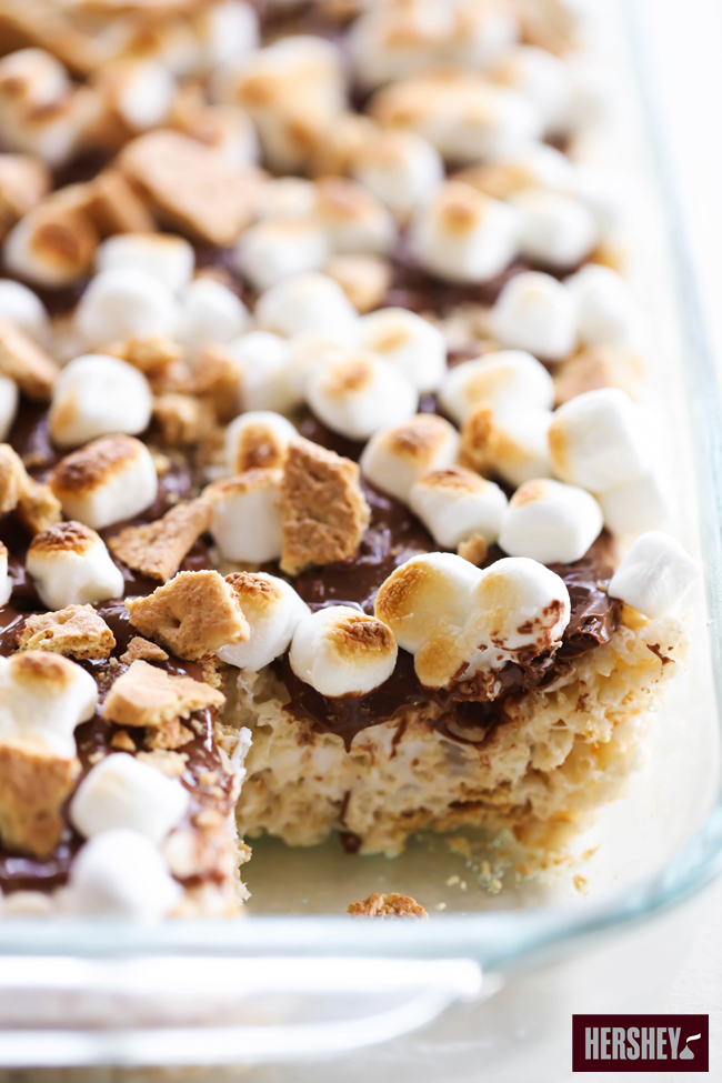  These HERSHEY'S Crispy S'more Treats are out of this world! The proportions of HERSHEY'S Chocolate Bar, gooey marshmallow and graham crackers are perfection. This is a simple dessert that is great for any occasion. sponsored by HERSHEY