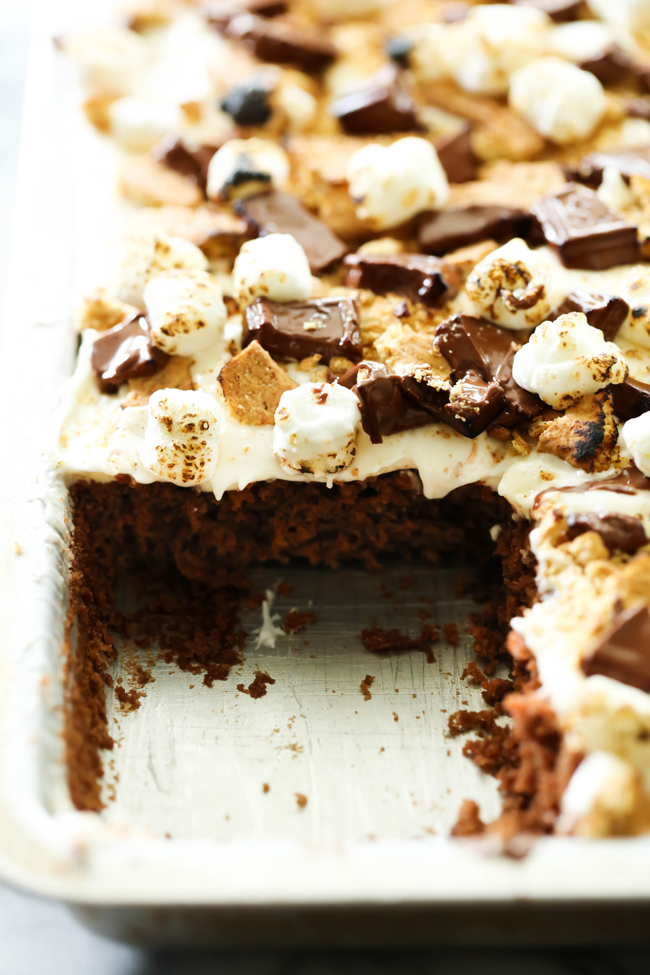 This S'more Sheet Cake is incredible! The summer flavors of chocolate, graham cracker and toasted marshmallow can be had any time of year with this moist and delicious sheet cake! This is definitely one you will want to make time and time again!
