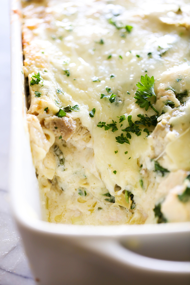 This Spinach Artichoke Lasagna is so rich, creamy and tastes INCREDIBLE! This recipe will quickly become a new family favorite!