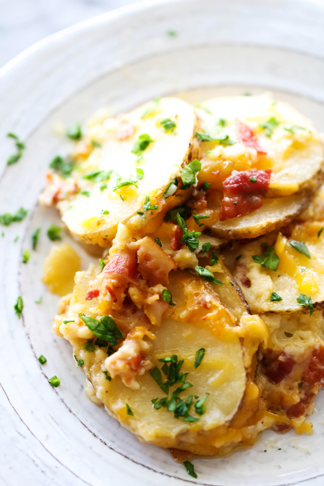 These Bacon Ranch Scalloped Potatoes are LOADED with incredible flavor. It will an instant favorite and soar to the top of your family's favorite side dishes!