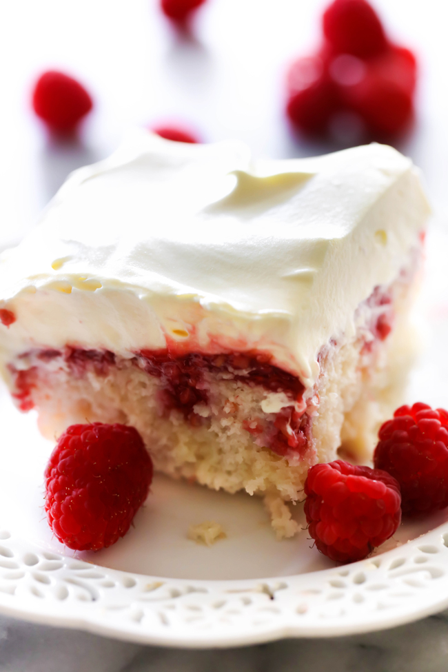 This Raspberry Poke Cake is so simple and such a wonderful dessert! It has a wonderful berry filling infused into each bite of cake that is both tart and sweet.