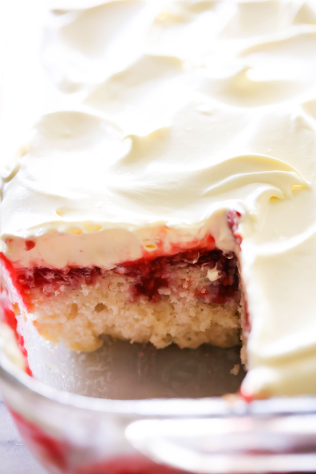 This Raspberry Poke Cake is so simple and such a wonderful dessert! It has a wonderful berry filling infused into each bite of cake that is both tart and sweet.