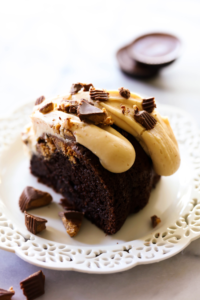 This Chocolate Peanut Butter Bundt Cake is super moist and delicious. It is loaded with Reese's Chocolates and is a chocolate-peanut butter lover's dream come true! The Peanut Butter Cream Cheese Frosting is out of this world!