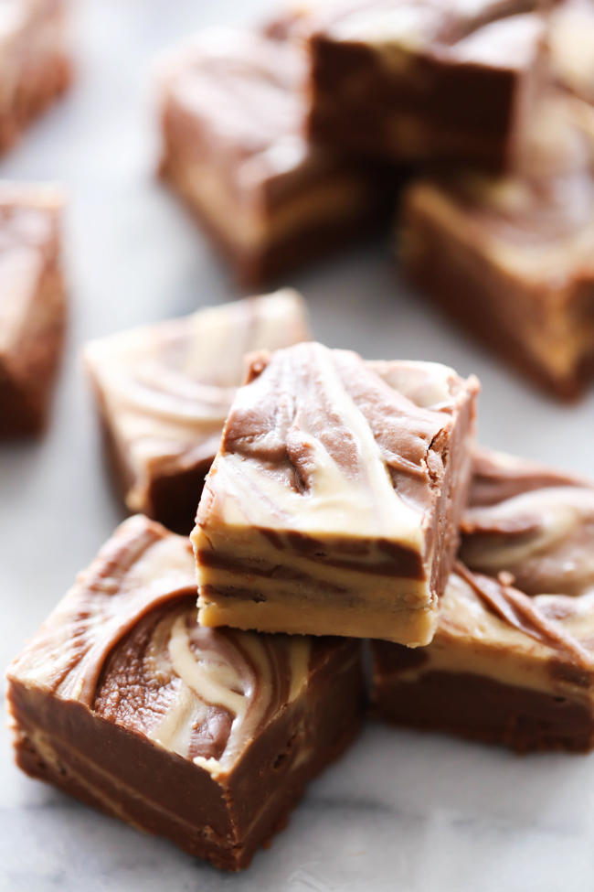 This Chocolate Peanut Butter Fudge is a wonderful and easy treat! It is smooth and creamy and is like a peanut butter cup in fudge form! Everyone who tries this recipe falls in love with it!