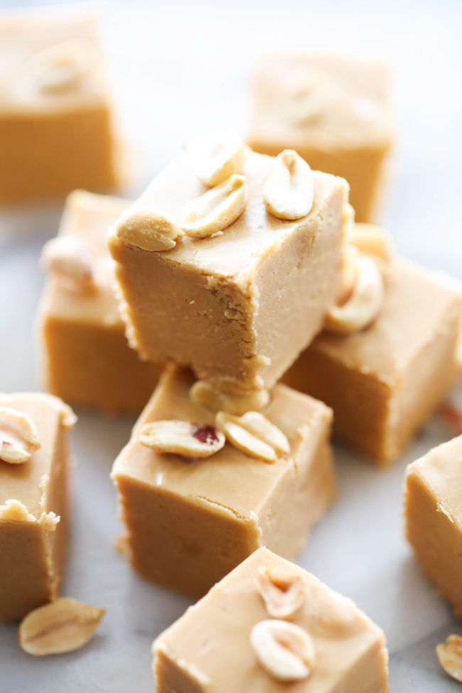 This Peanut Butter Fudge is creamy and absolutely divine! It is topped with crunchy peanuts and is the perfect treat!