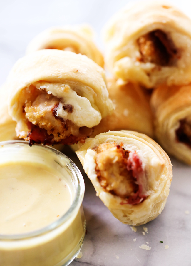These Chicken Cordon Bleu Pastry Bites are absolutely HEAVENLY! Paired with a special sauce, these will be one appetizer your company can not get there hands off of!