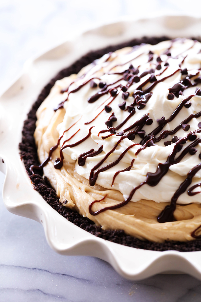 This Chocolate Peanut Butter Cream Pie is a show stopper! The amount of peanut butter flavor is perfection and wonderfully paired with a simple Oreo crust. The two together make for a heavenly bite each and every time!