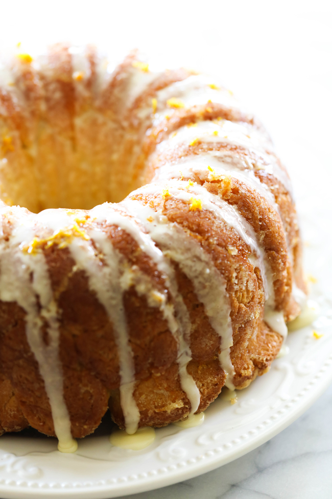This Orange Creamsicle Pull Apart Bread is completely made from scratch. It tastes like orange rolls in the form of a delicious and fun breakfast or dessert! It has such a refreshing flavor and is the perfect spring or summertime treat!