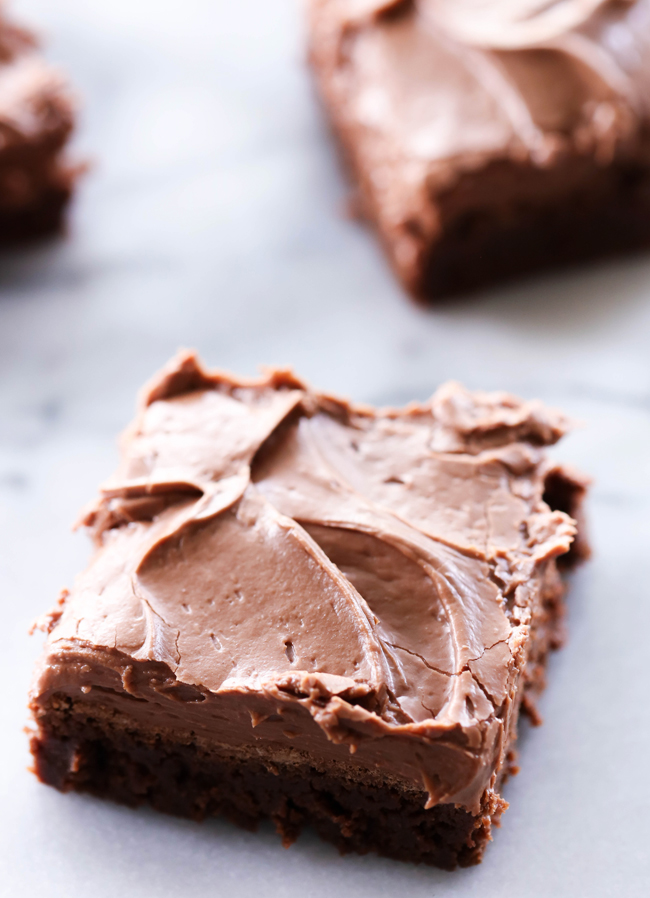 These Chocolate Cream Cheese Frosted Brownies are such a simple yet delicious dessert. The brownies are rich and dense and are topped with such a light and fluffy Chocolate Cream Cheese Frosting. Together, the pair to make one absolutely yummy chocolate treat!