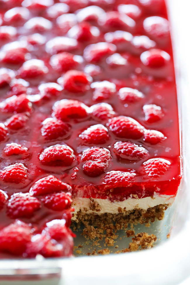 This Raspberry Pretzel Jello Dessert is the perfect combo of sweet and salty and a hint of tart. The three layers combine wonderfully for a crunchy, creamy and fruity treat that will have have everyone coming back for more!