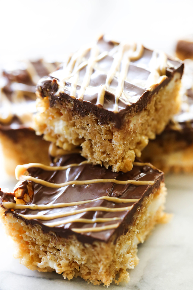 These Chocolate Peanut Butter Rice Krispie Treats are the perfect quick and easy snack! This recipe whips up in no time at all and is adored by both kids and adults. If you love chocolate and peanut butter then this is the treat for you!