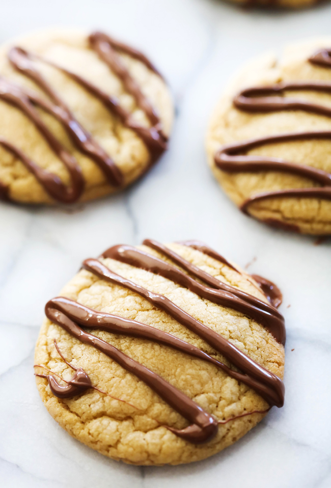 Nutella Lava Cookies with Nutella drizzled over the tops.